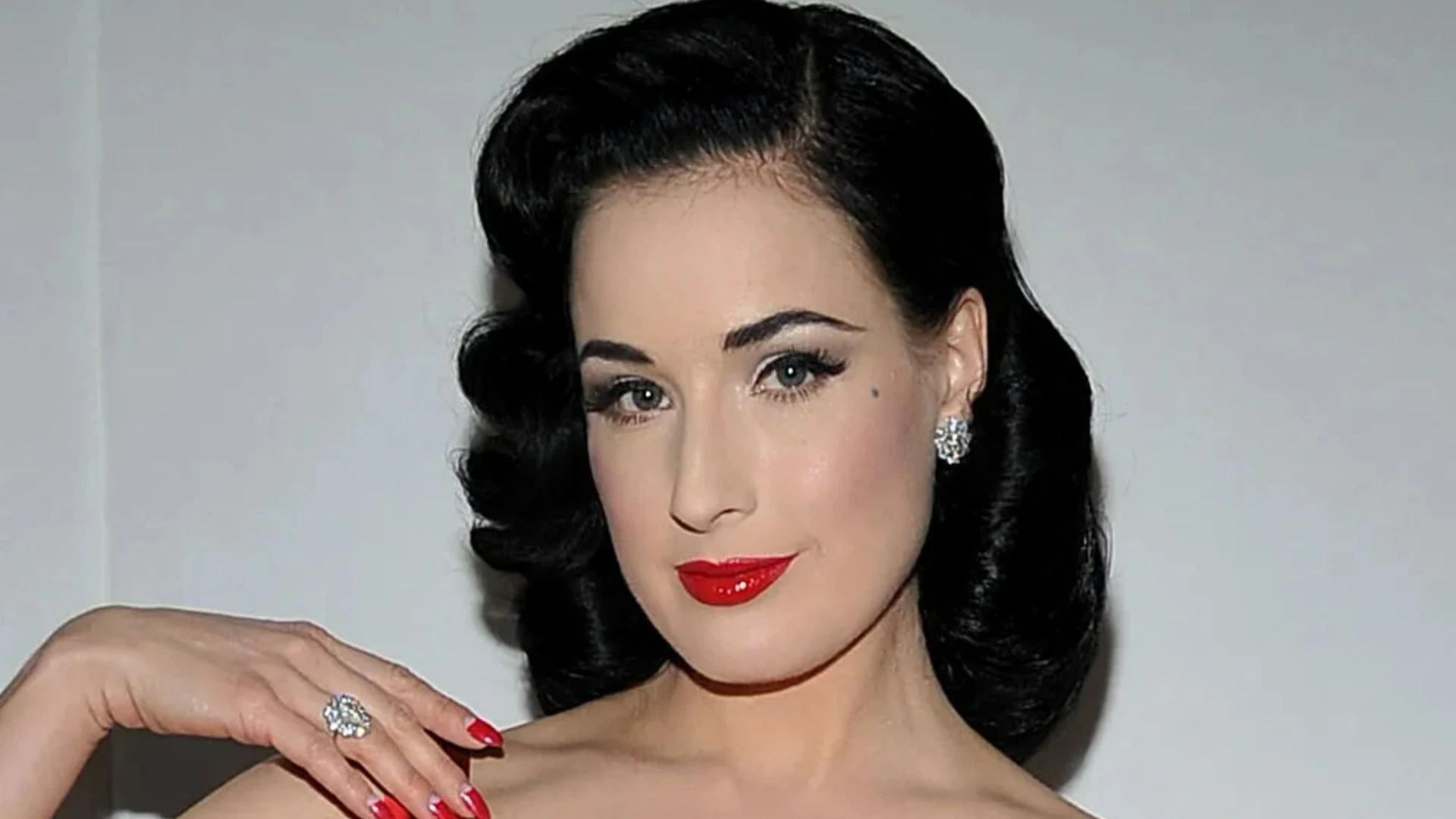 Dita Von Teese reveals she secretly dated HUGE British pop star in Nineties