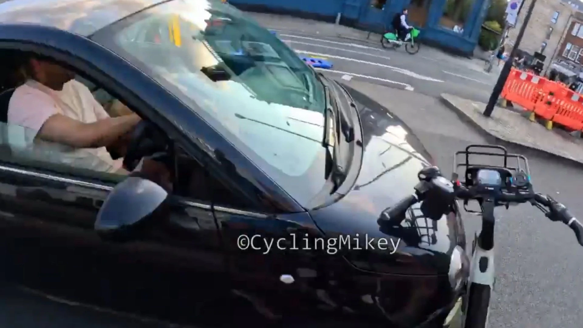 Vigilante cyclist who pushed bike into car he tried to stop makes bizarre excuse