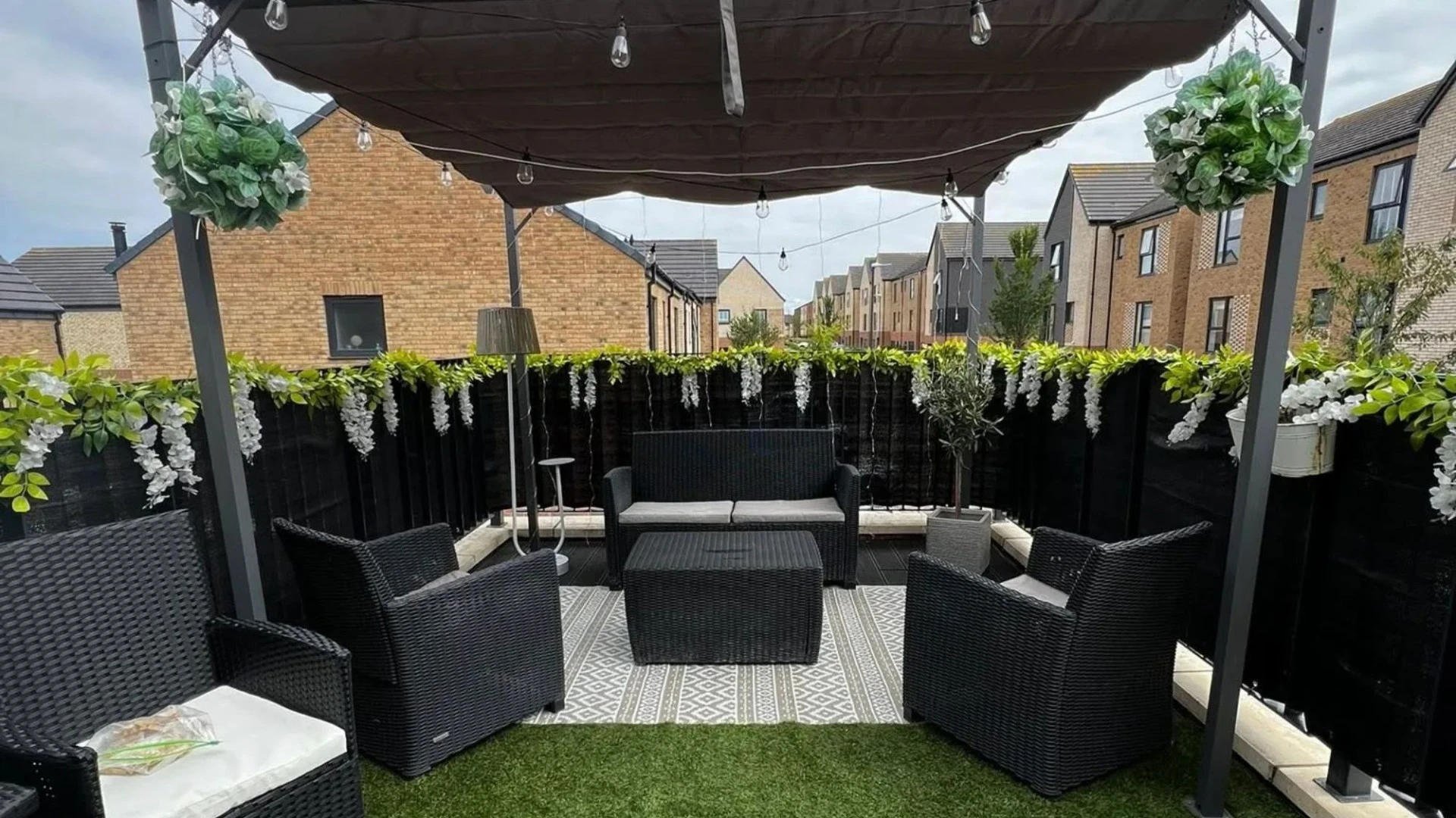 I turned my small balcony into a slice of heaven with £7 grass & B&M baskets