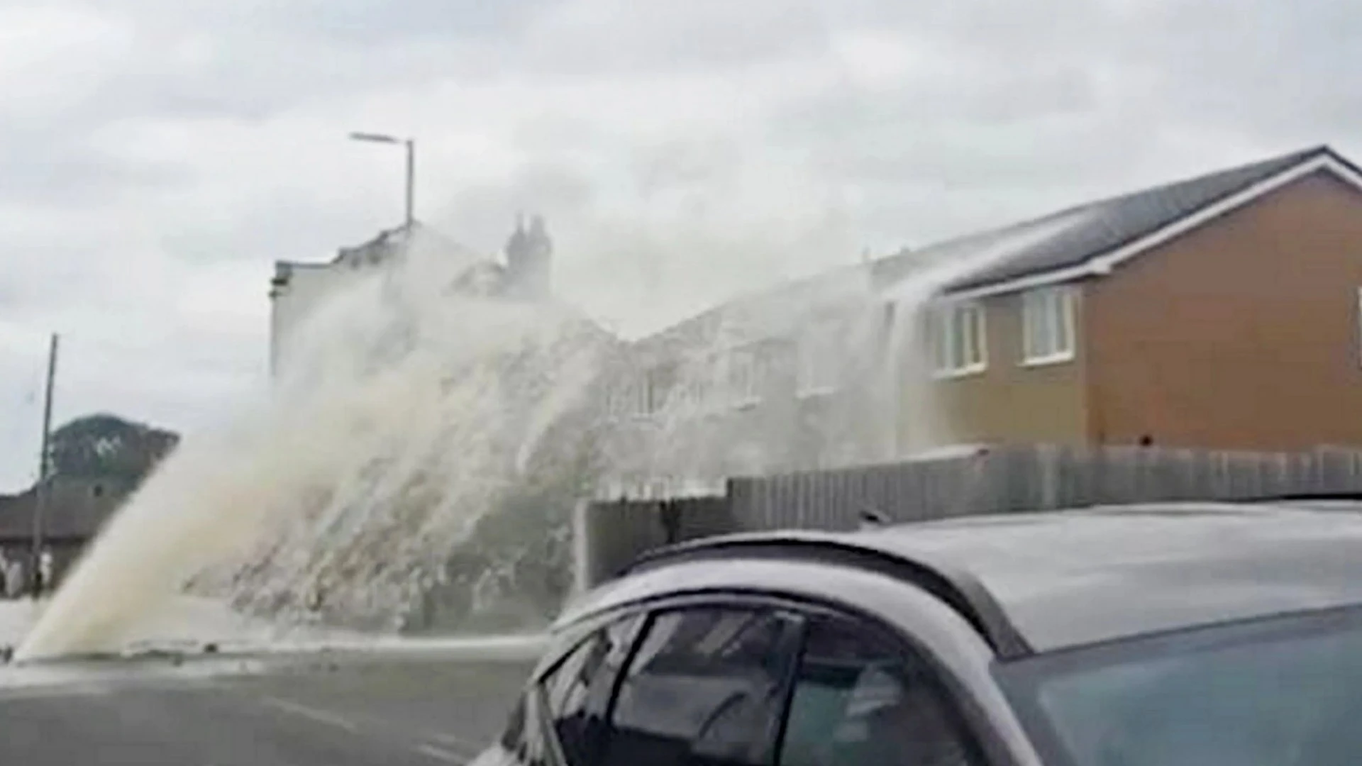 Moment burst pipe sends thousands of gallons of water crashing into house