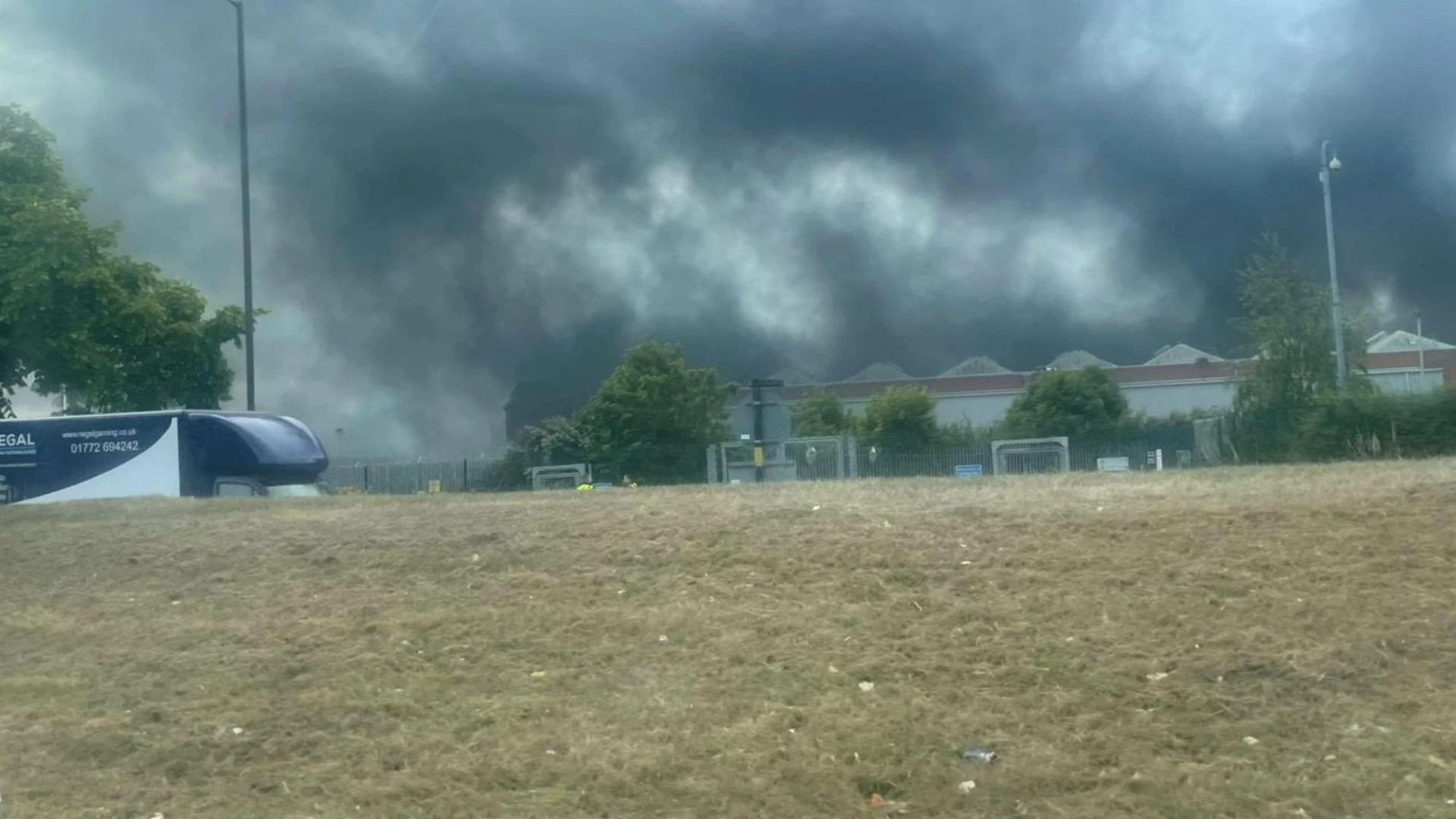 Blaze rips through Jaguar Land Rover factory filling sky with smoke