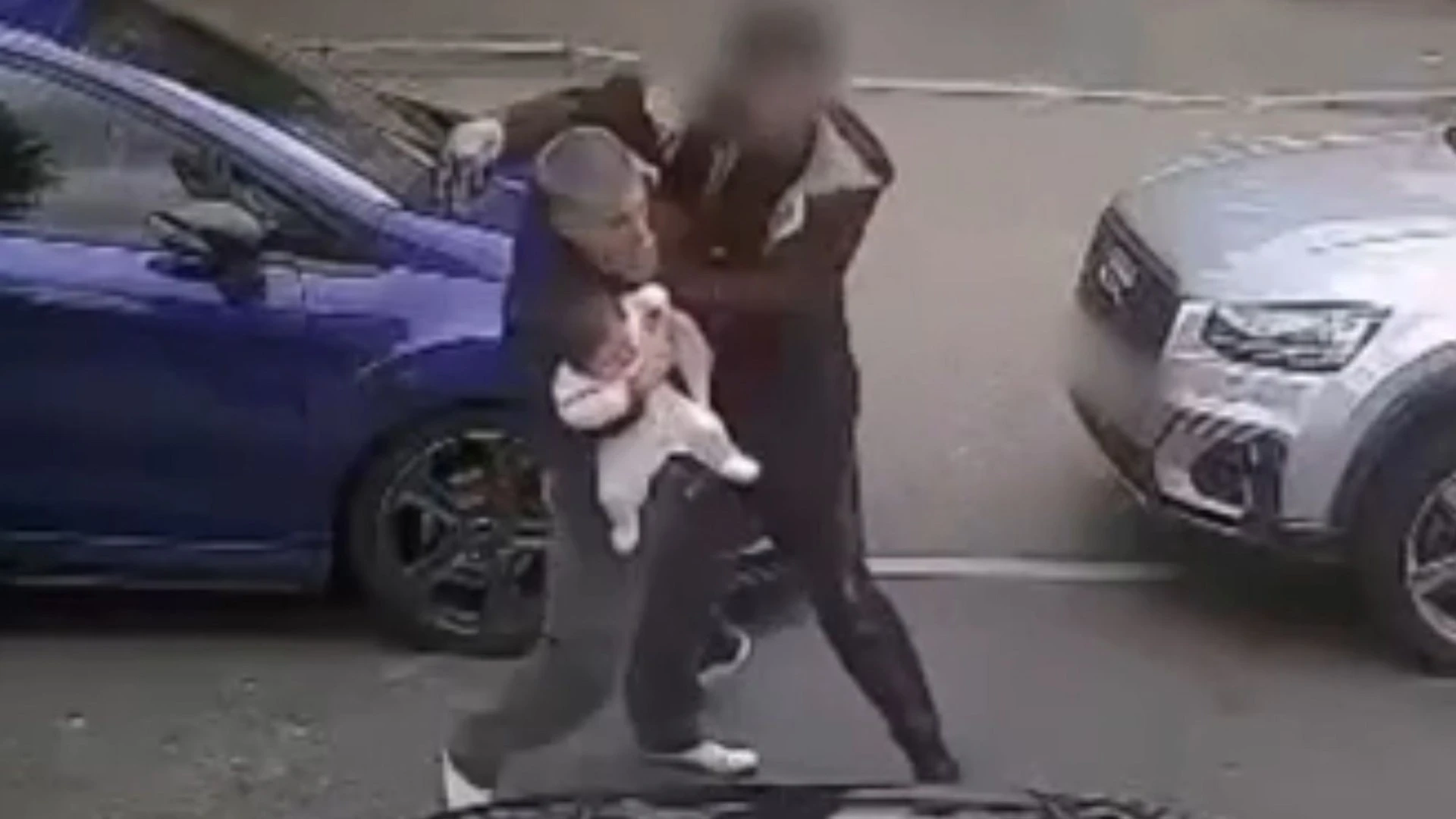 Horror moment dad carrying 3-month old baby girl is attacked in street
