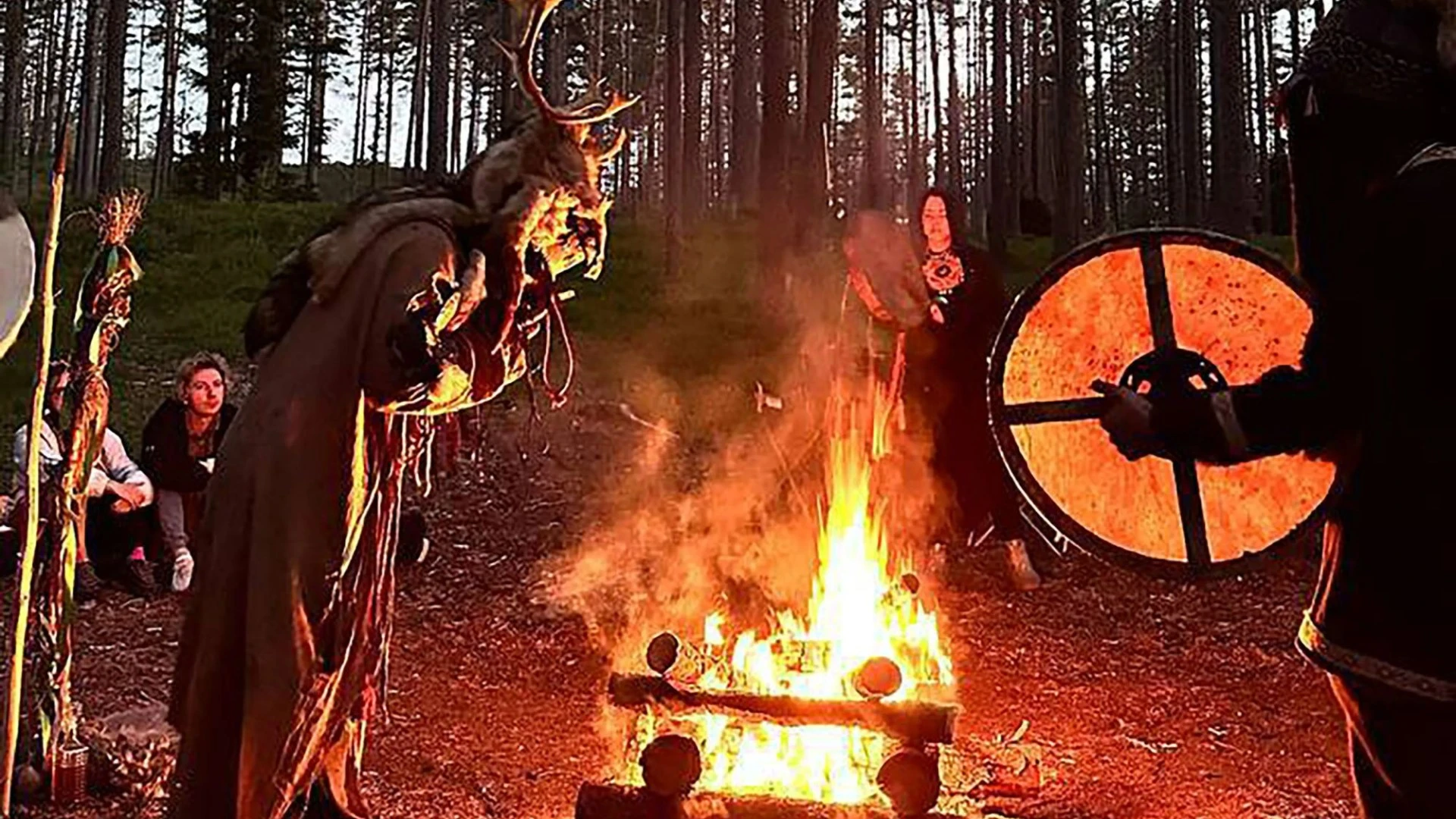 Moment cops raid BURIAL to rescue cult followers wrapped like mummies in graves
