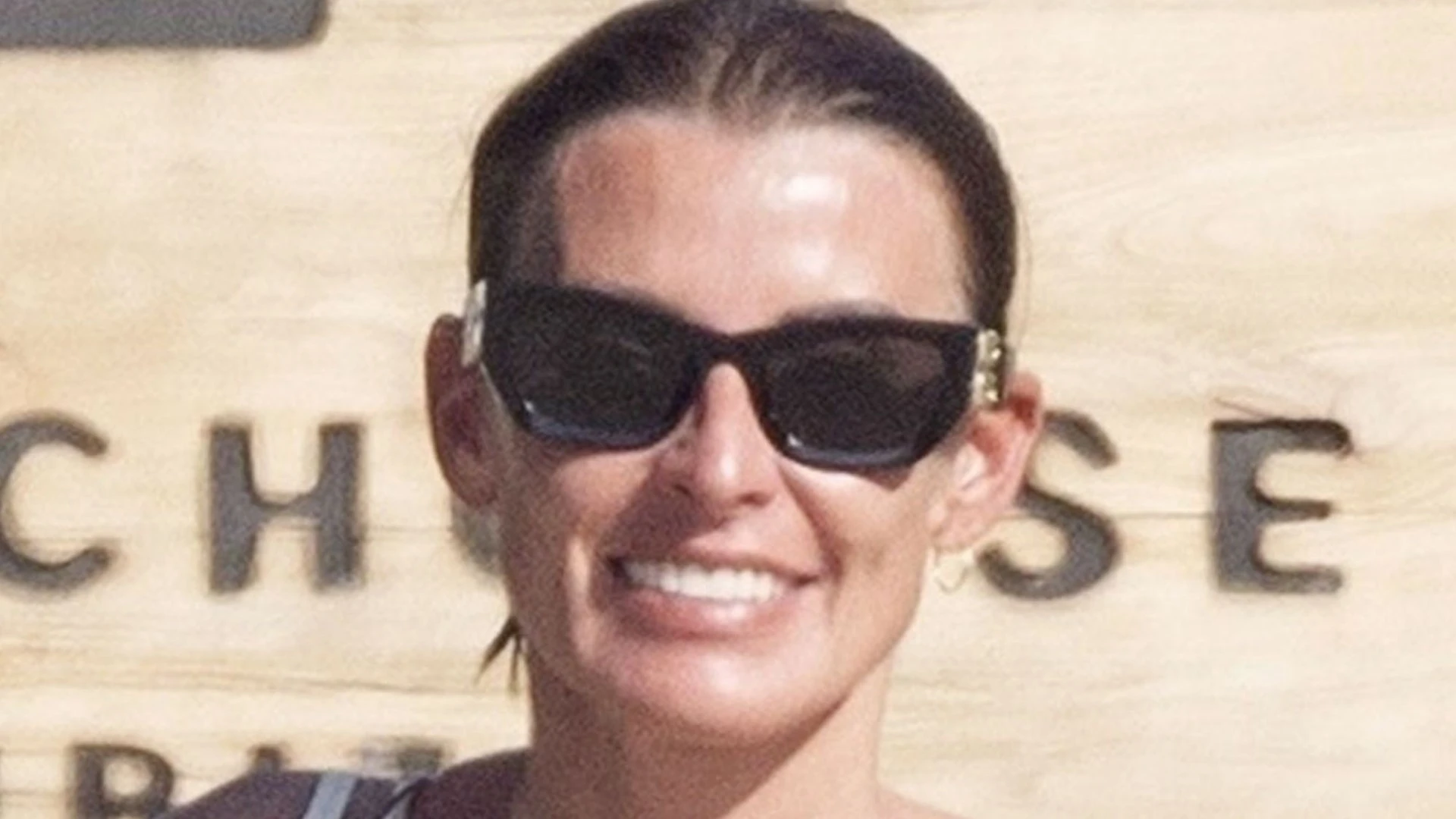 Coleen Rooney shows off incredible abs in sea with fellow WAG on family hol