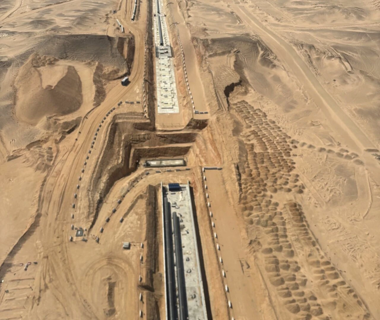 Aerial pics show world’s biggest building site for sideways skyscraper