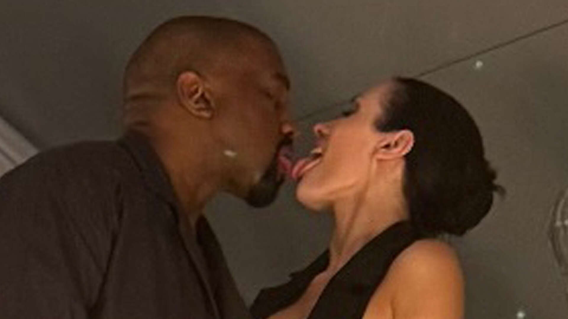 Bianca Censori rocks teeny top as she straddles Kanye West at birthday bash