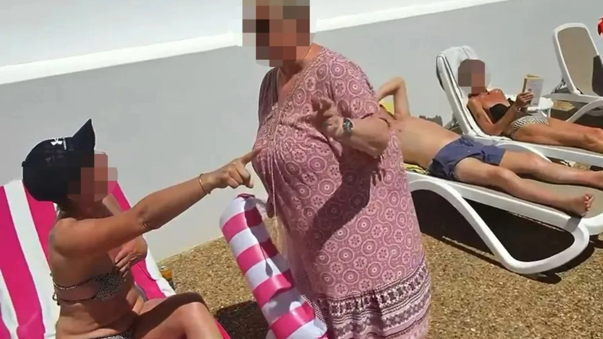 Watch moment tourist goes berserk as lady sits on sunbed she’s ‘using all week’