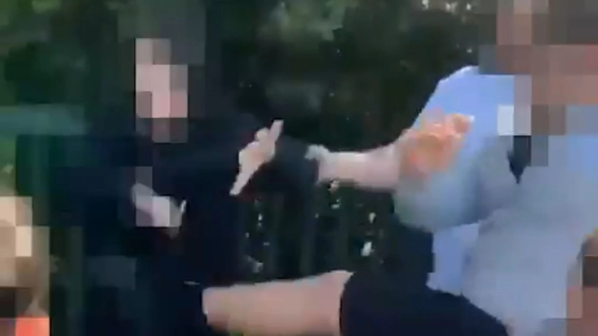 Horrific moment man holds schoolboy’s jumper while children beat him up