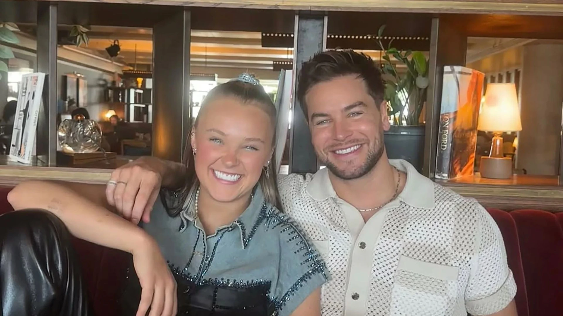 JoJo Siwa is returning to UK to be with Chris Hughes as they're seen kissing