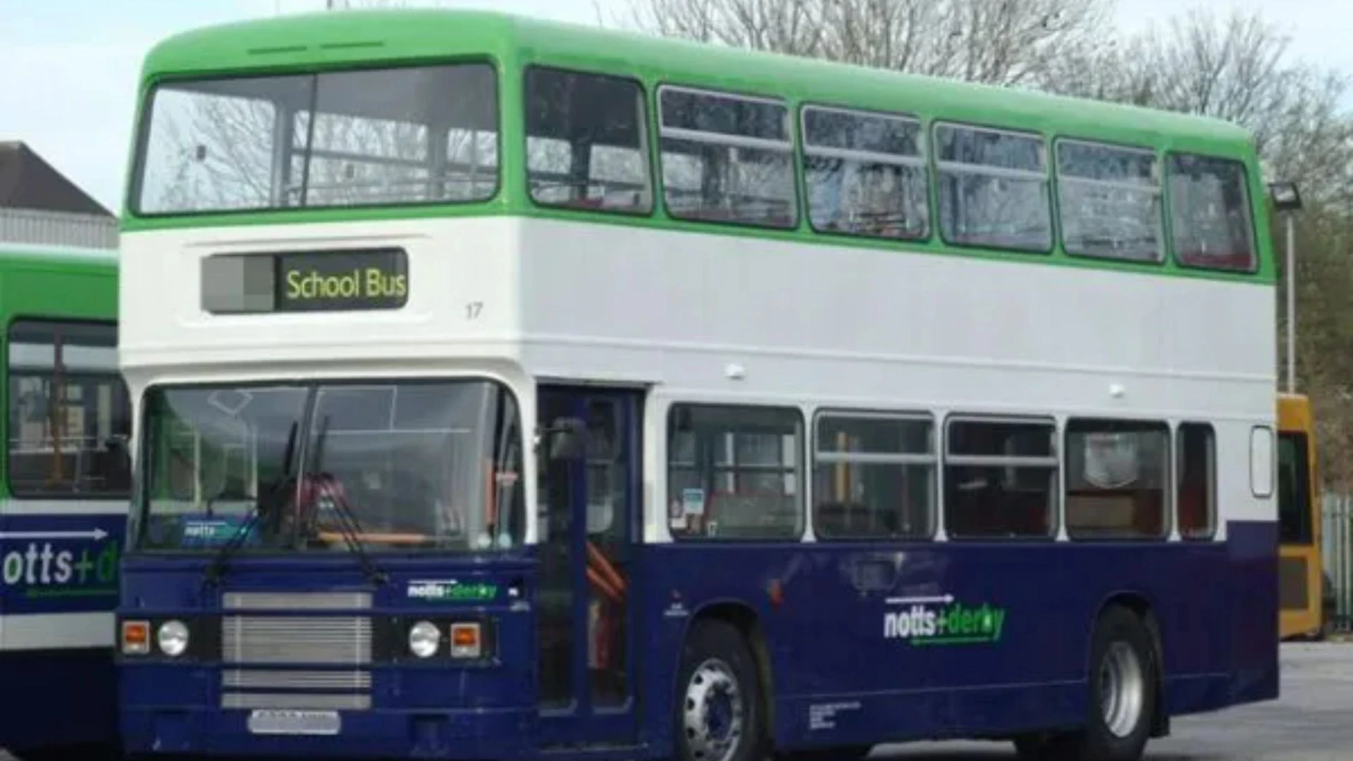 Schoolboy plunges from top of double-decker bus after falling out of WINDOW