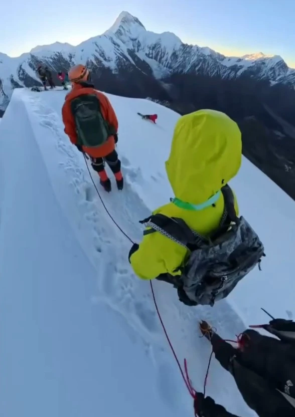 Moment hiker plunges to his death from 18,000ft mountain after taking selfie