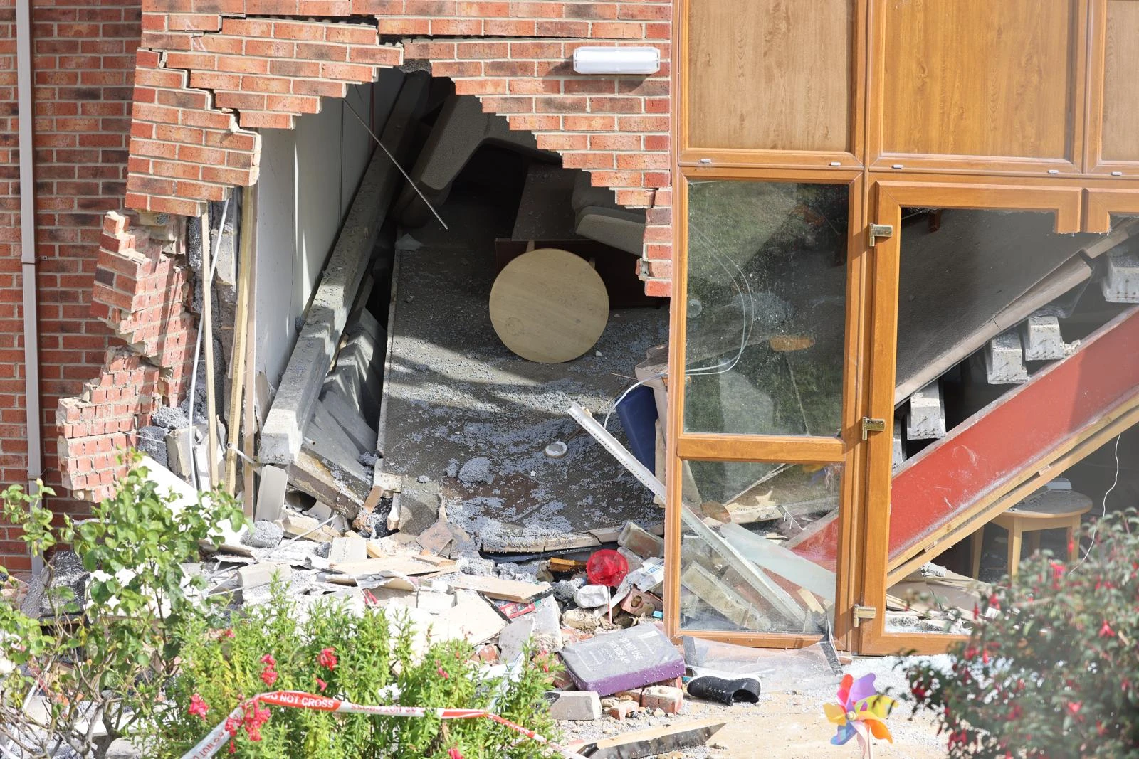 Eight people hospitalised as BMW ploughs into care home in horror crash