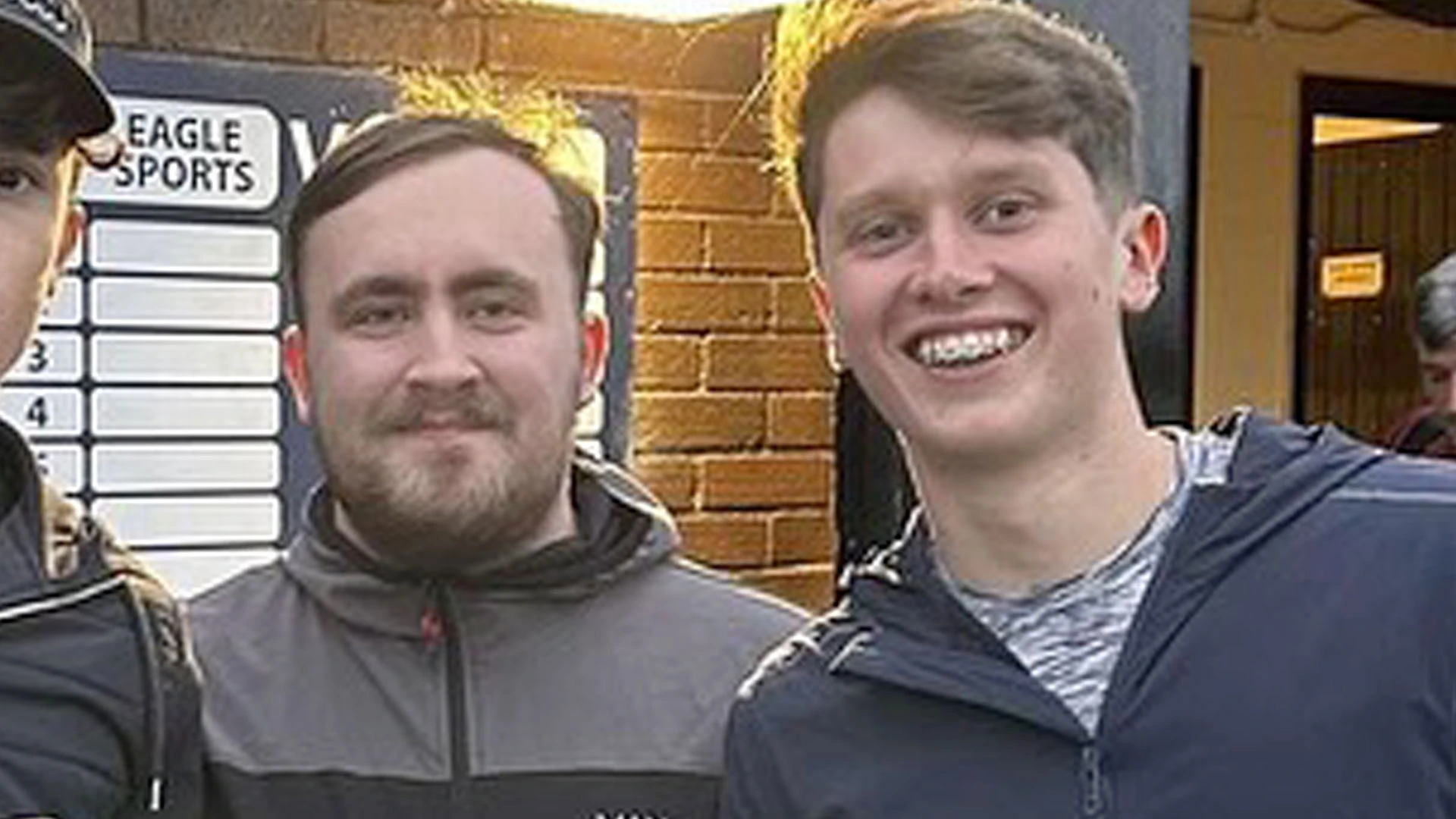 Humble Littler poses for photos with youngsters as he watches local youth team