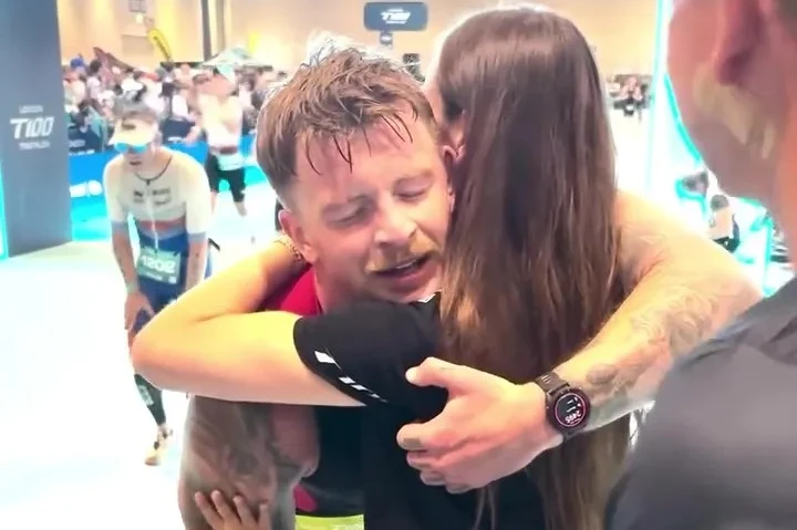 Adam Peaty kisses fiancee Holly and hugs Gordon Ramsay after first triathlon