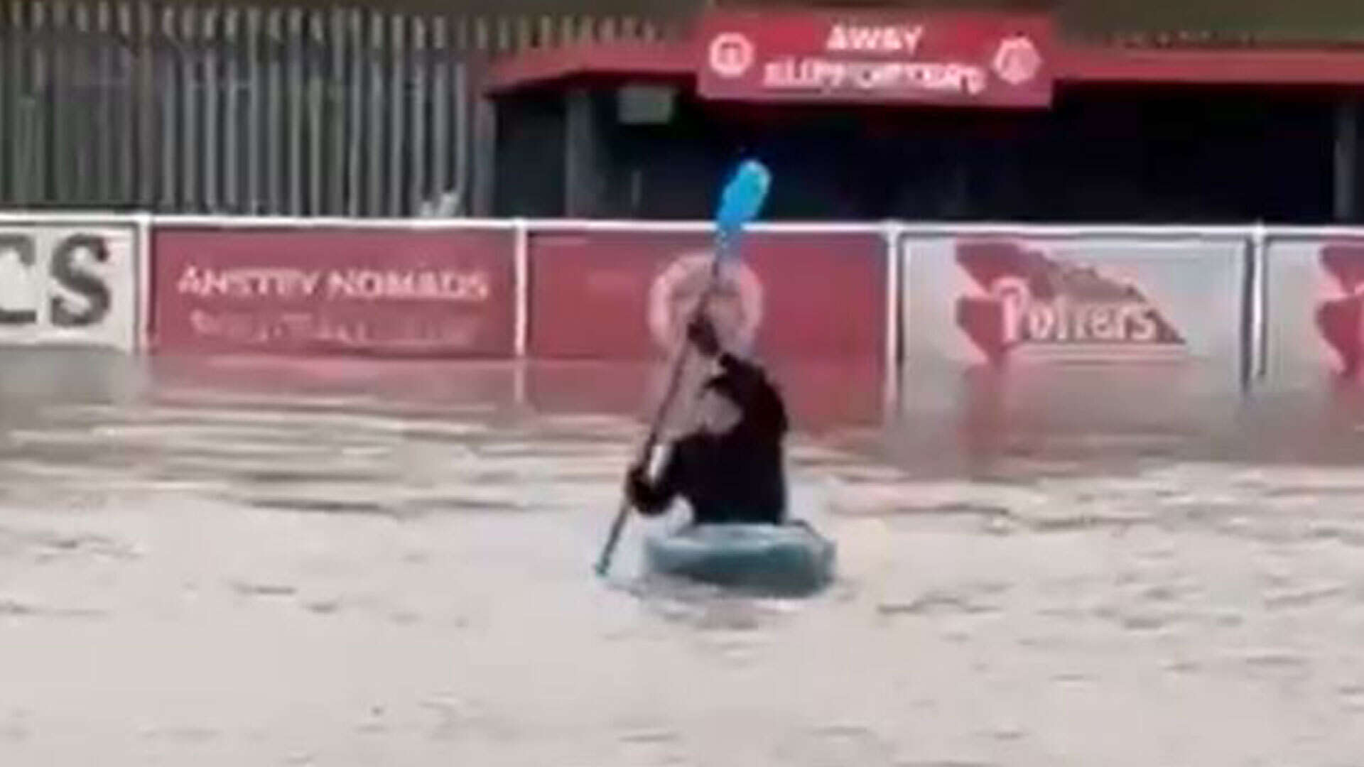 Watch bizarre moment non-league chairman kayaks on his club's pitch