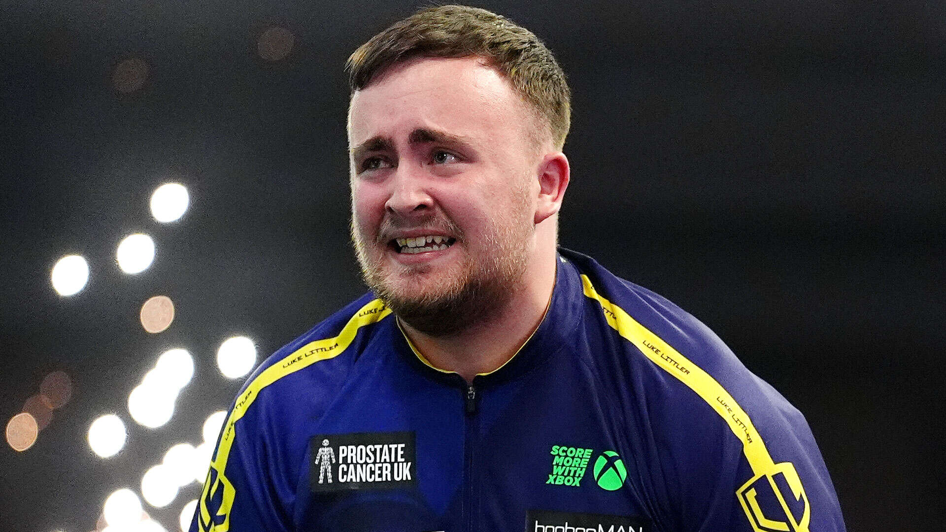 Luke Littler, 17, breaks down in tears moments after stunning Michael van Gerwen