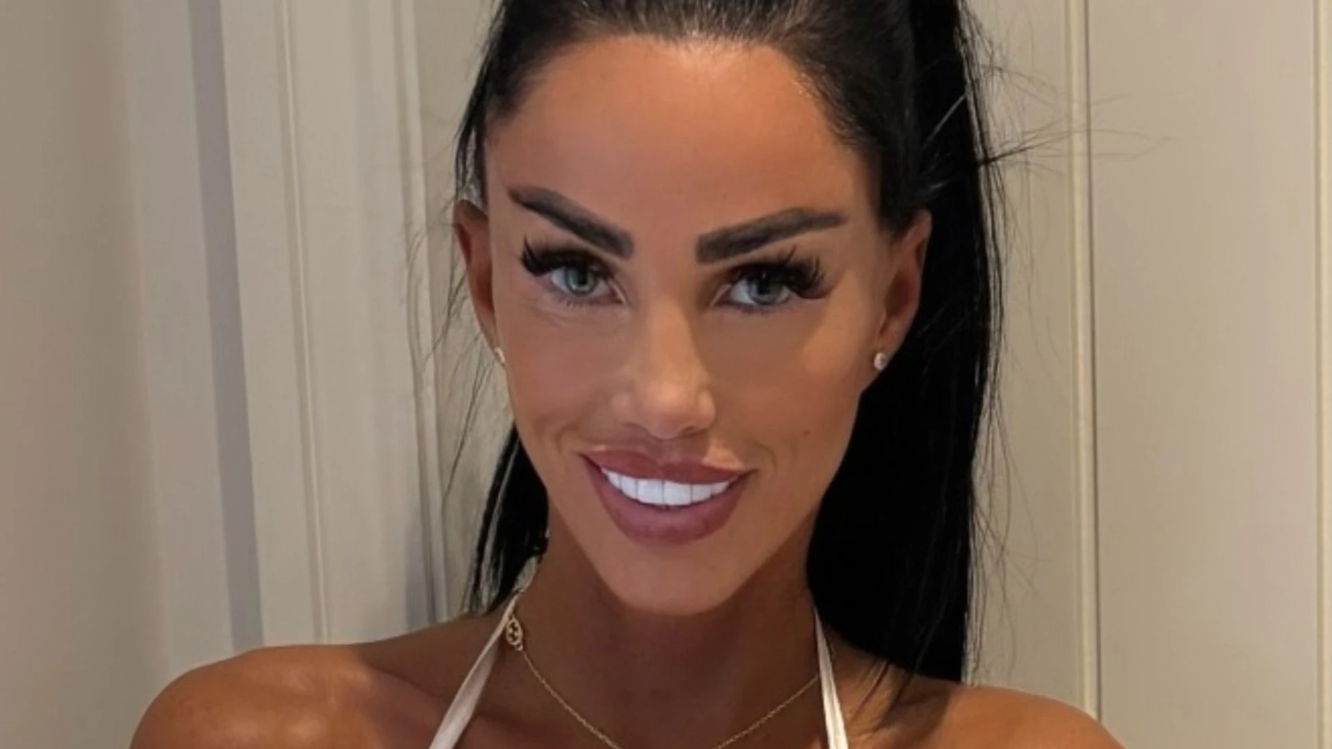 Katie Price’s £10k facelift looks tighter than ever as she models dresses