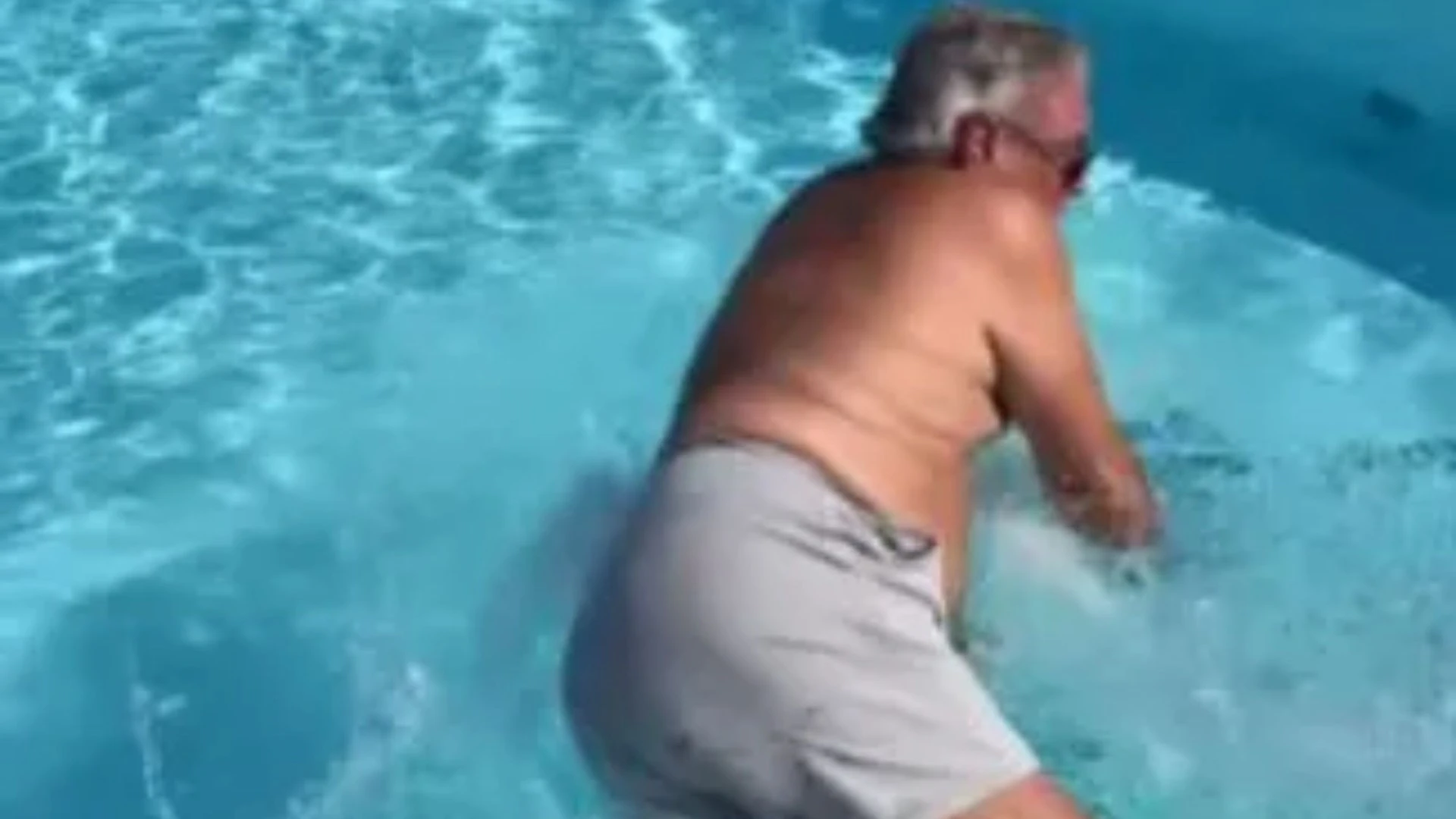 Mark Wright slammed as he pushes his dad into pool for 'cruel' prank 