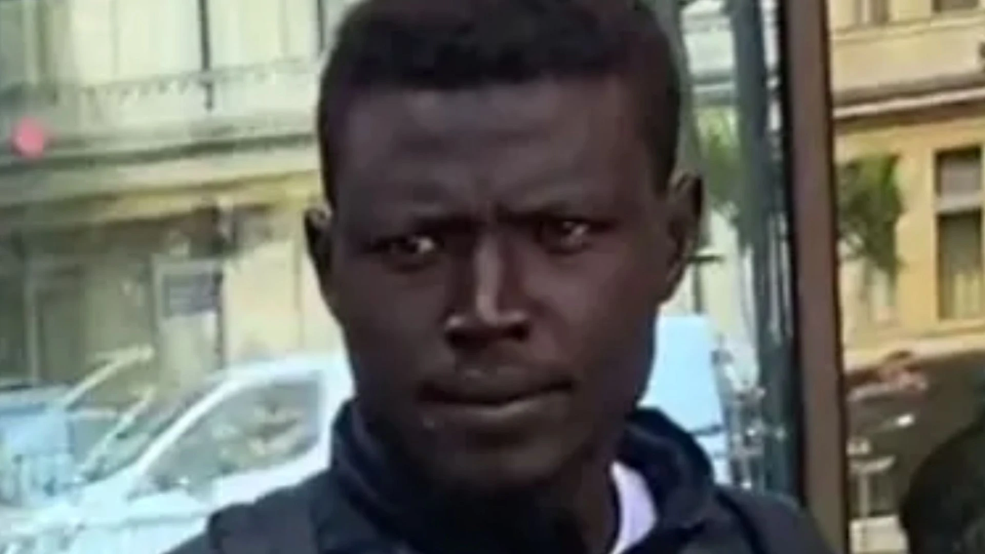 Homeless migrant who came to UK on dinghy denies spitting at cop