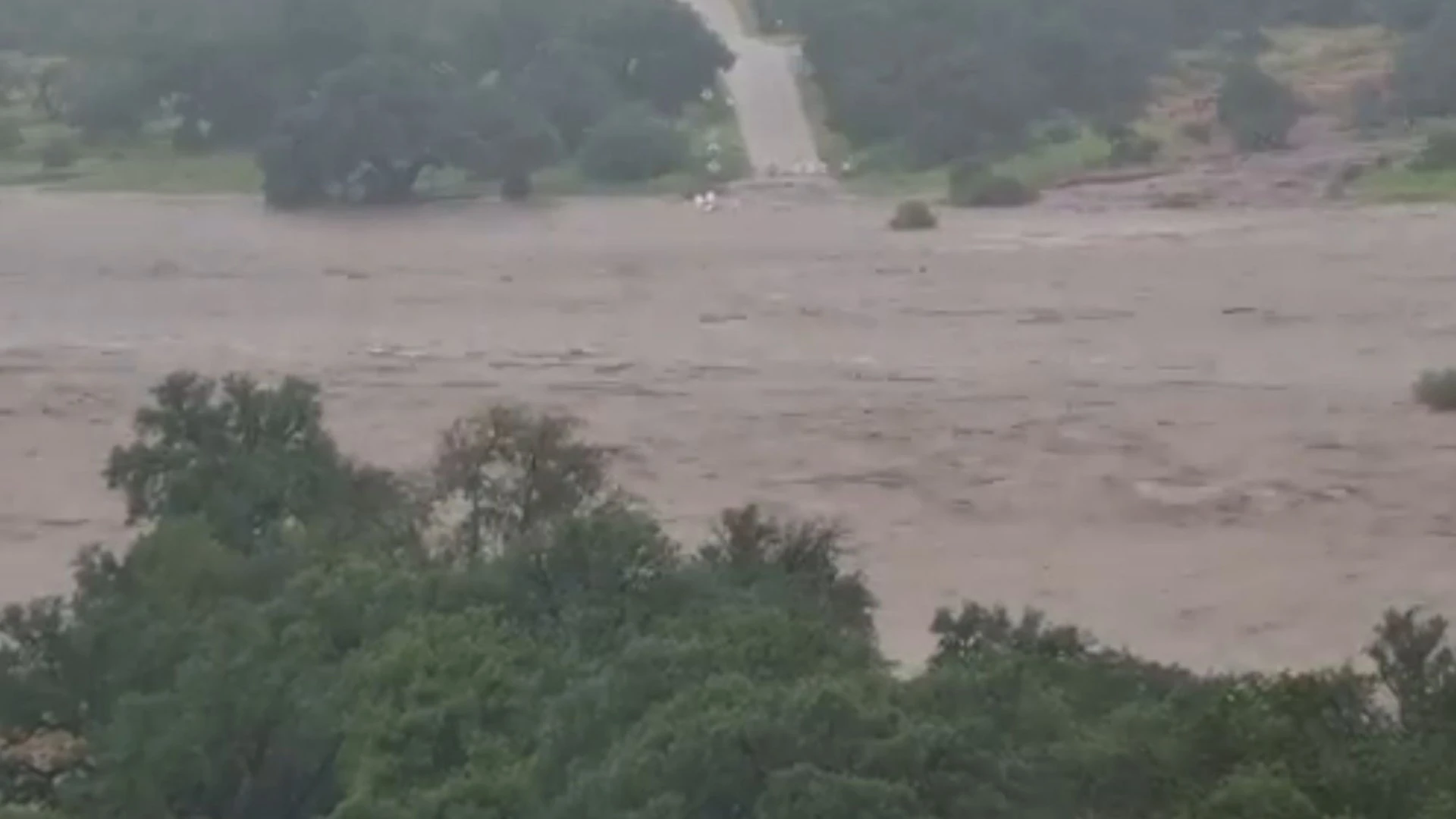 Horror vid shows Texas river swallow bridge in just 2 MINUTES in killer floods
