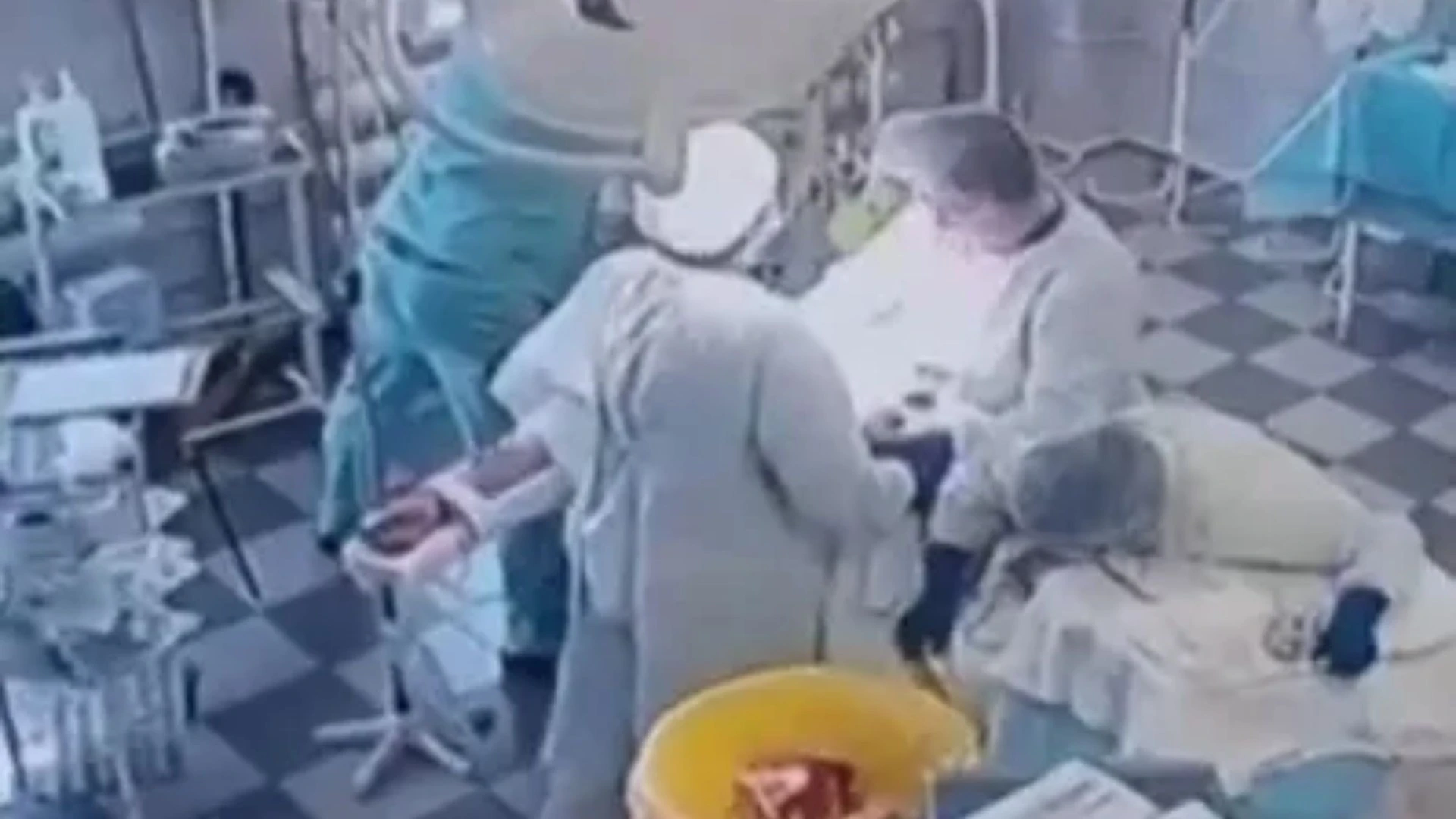 Moment doctors continue performing surgery on patient during 8.8-mag quake