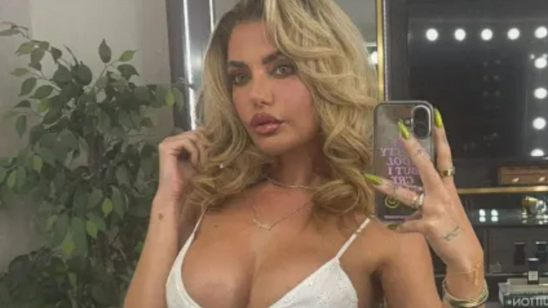 Megan Barton-Hanson stuns in plunging bra top & minuscule shorts
