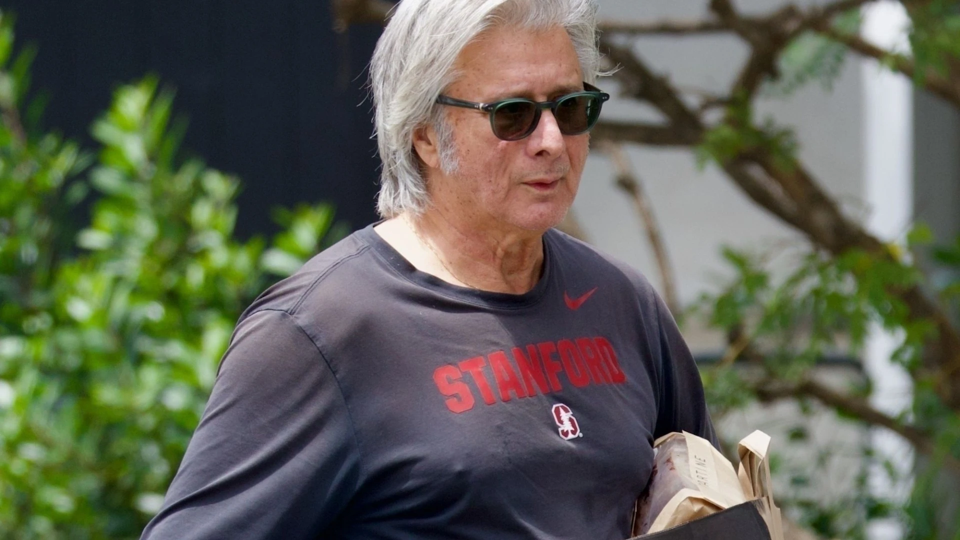 Rarely seen 80s rock legend unrecognisable as he's spotted on day out in LA