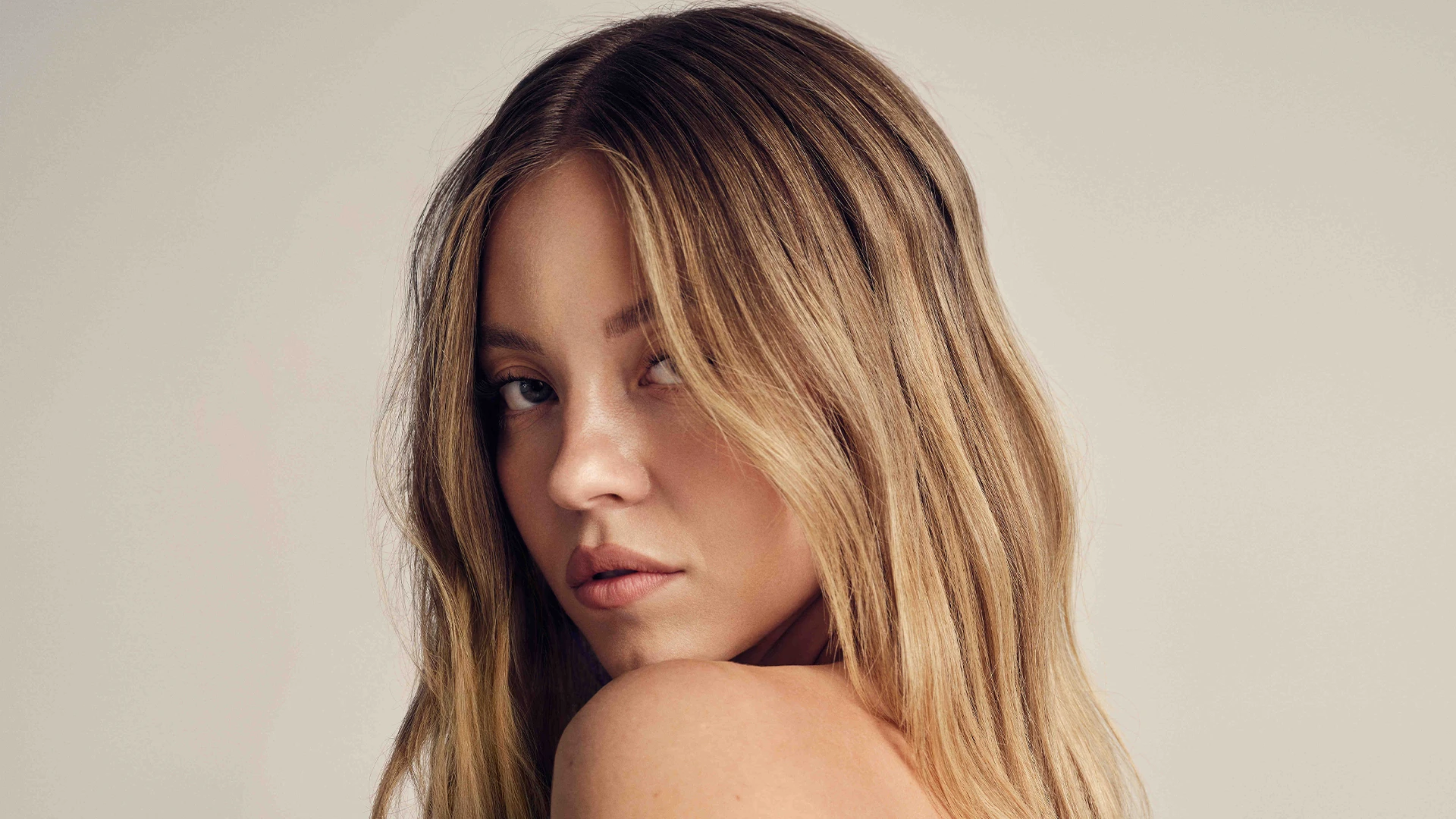 Sydney Sweeney goes topless under just a denim jacket for American Eagle shoot