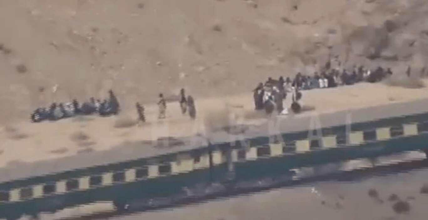 Dozens dead & 300 taken hostage as bomb-vest wearing gunman hijack train