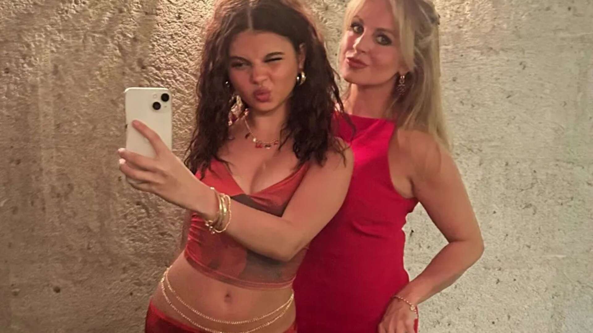 Tina O'Brien, 41, stuns in red mini dress alongside lookalike daughter, 16