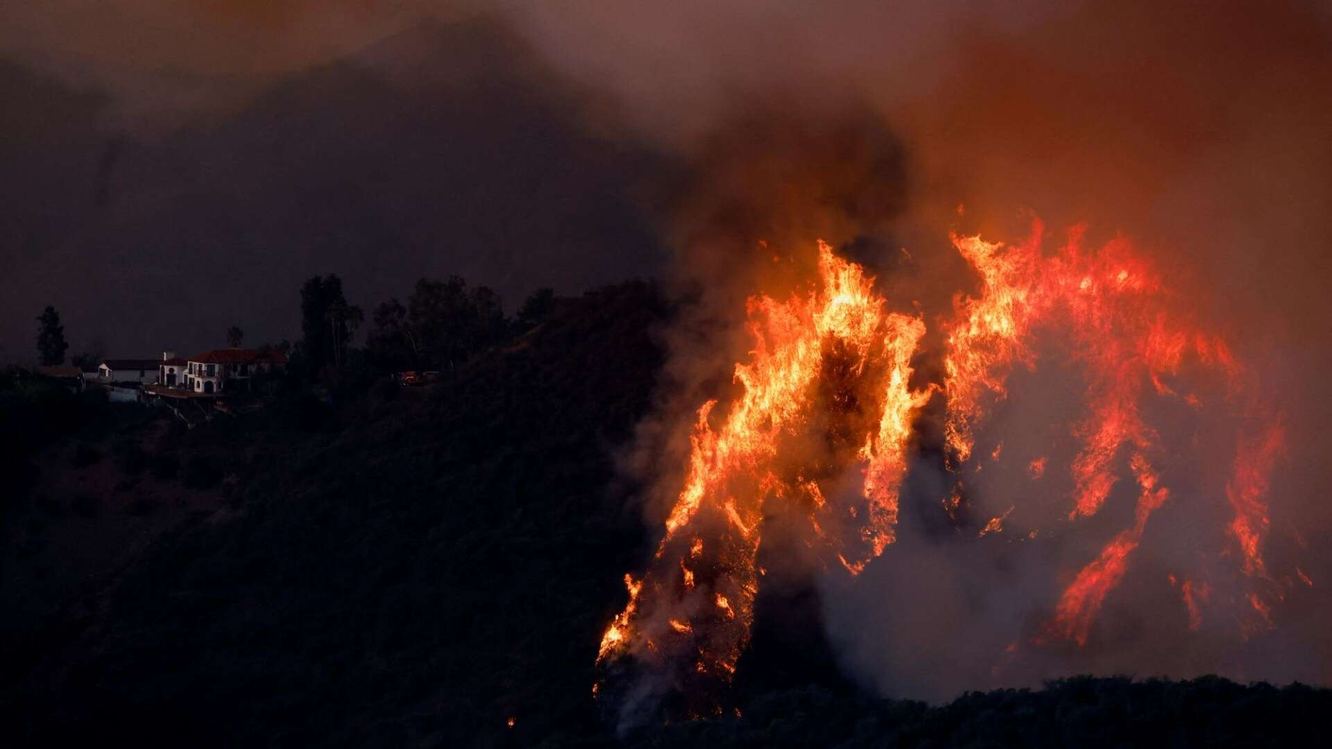 LA wildfires roar towards more celeb-packed enclaves as 70mph winds forecast