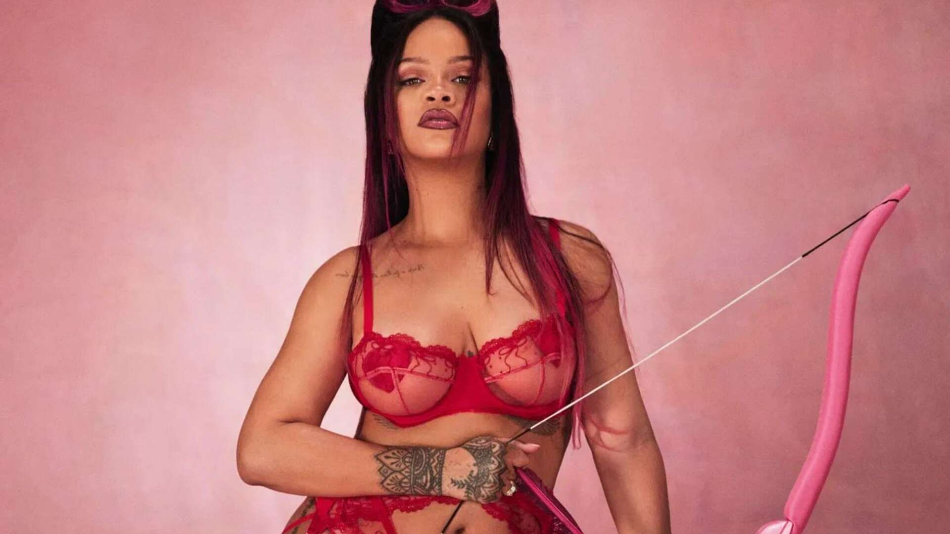 Rihanna looks red hot as she strips to lace lingerie for Valentine's Day shoot