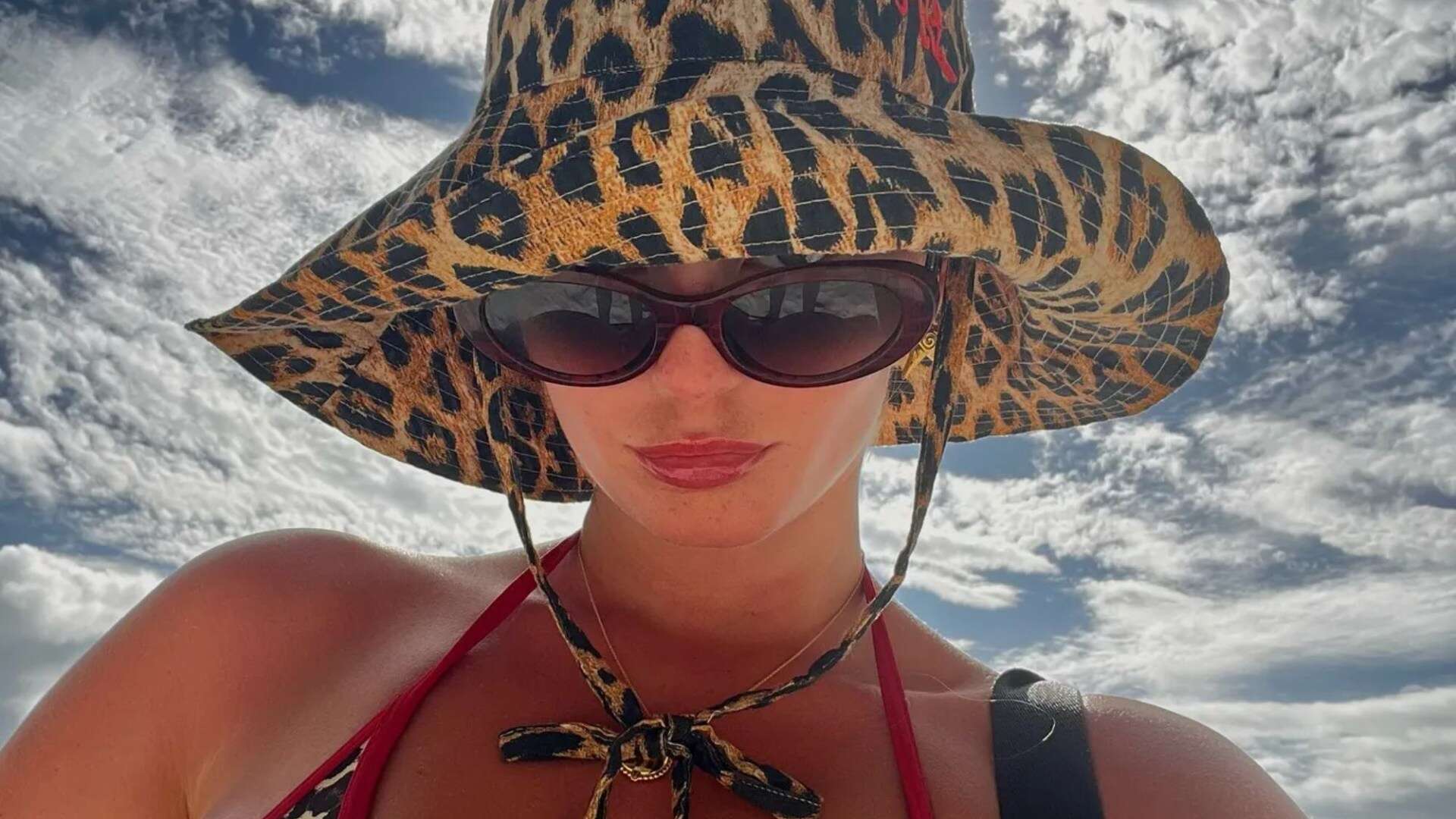 Corrie’s Millie Gibson looks worlds away from the cobbles in a bikini