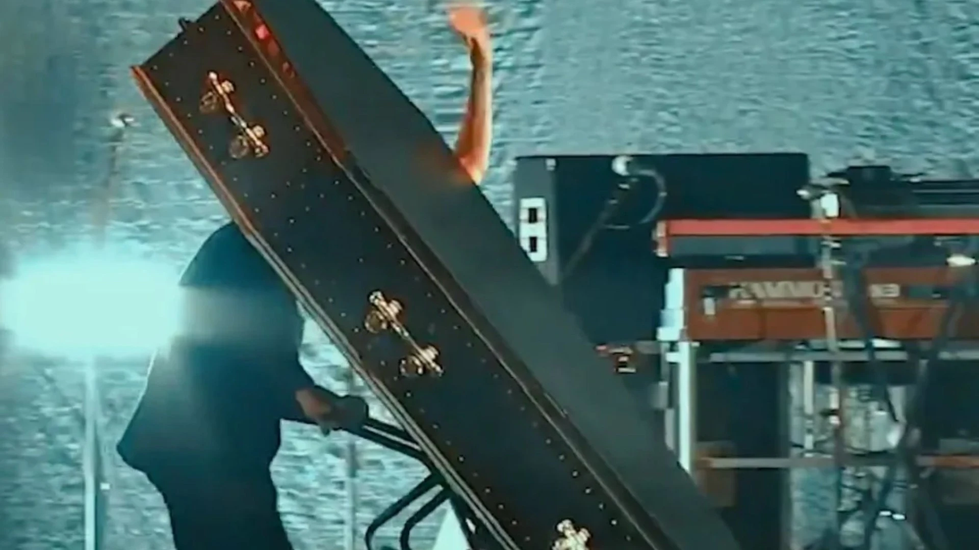 Rock icon's bizarre farewell to UK concert as he's hauled off in COFFIN