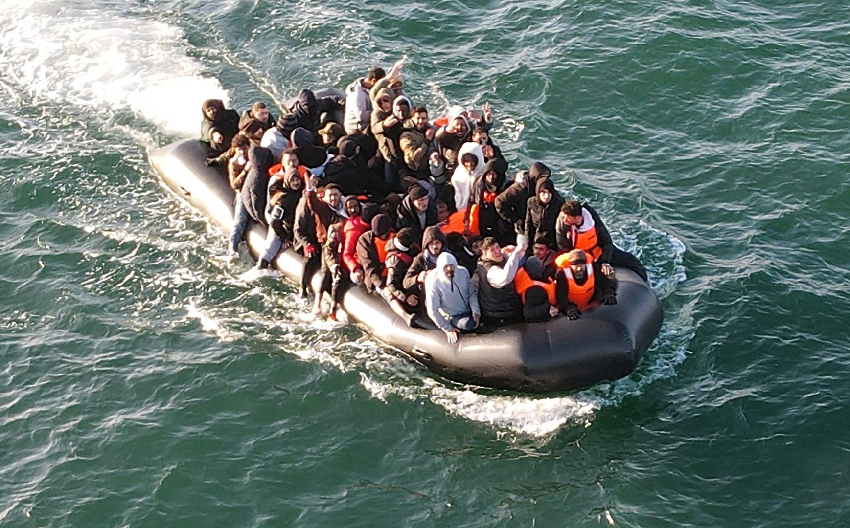 Shocking pic shows overcrowded boat bursting at seams with migrants