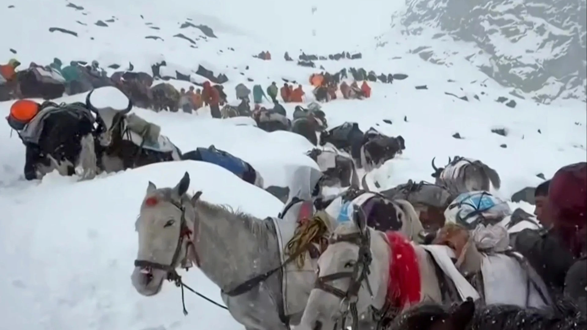 Fears final 200 hikers still trapped on Everest will be buried alive by snow