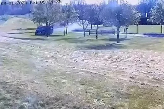 Woman dies after being struck by van on golf course in police chase