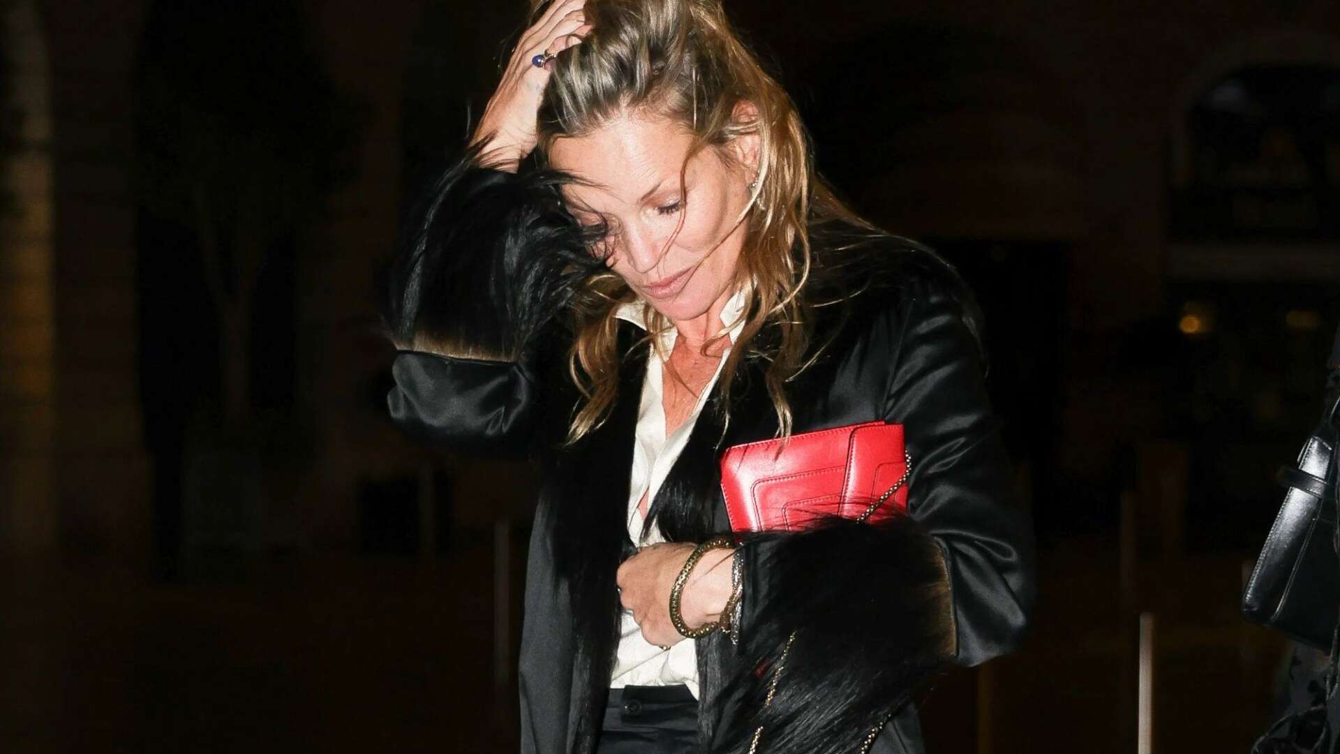 Kate Moss looks all partied out at 2am after stunning in a plunging top at PFW