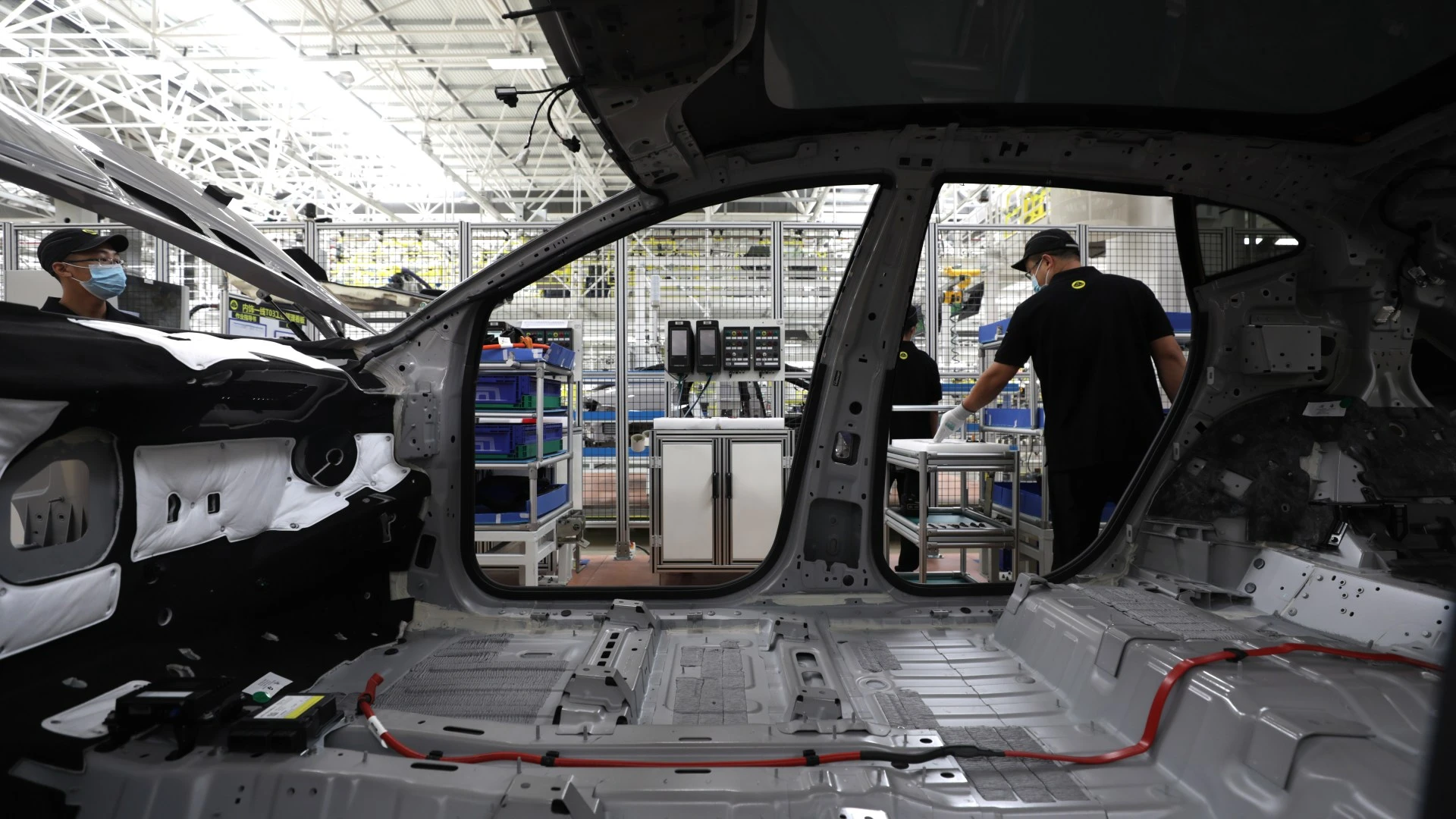 Iconic UK car brand axes HUNDREDS of jobs to survive 'volatile' times
