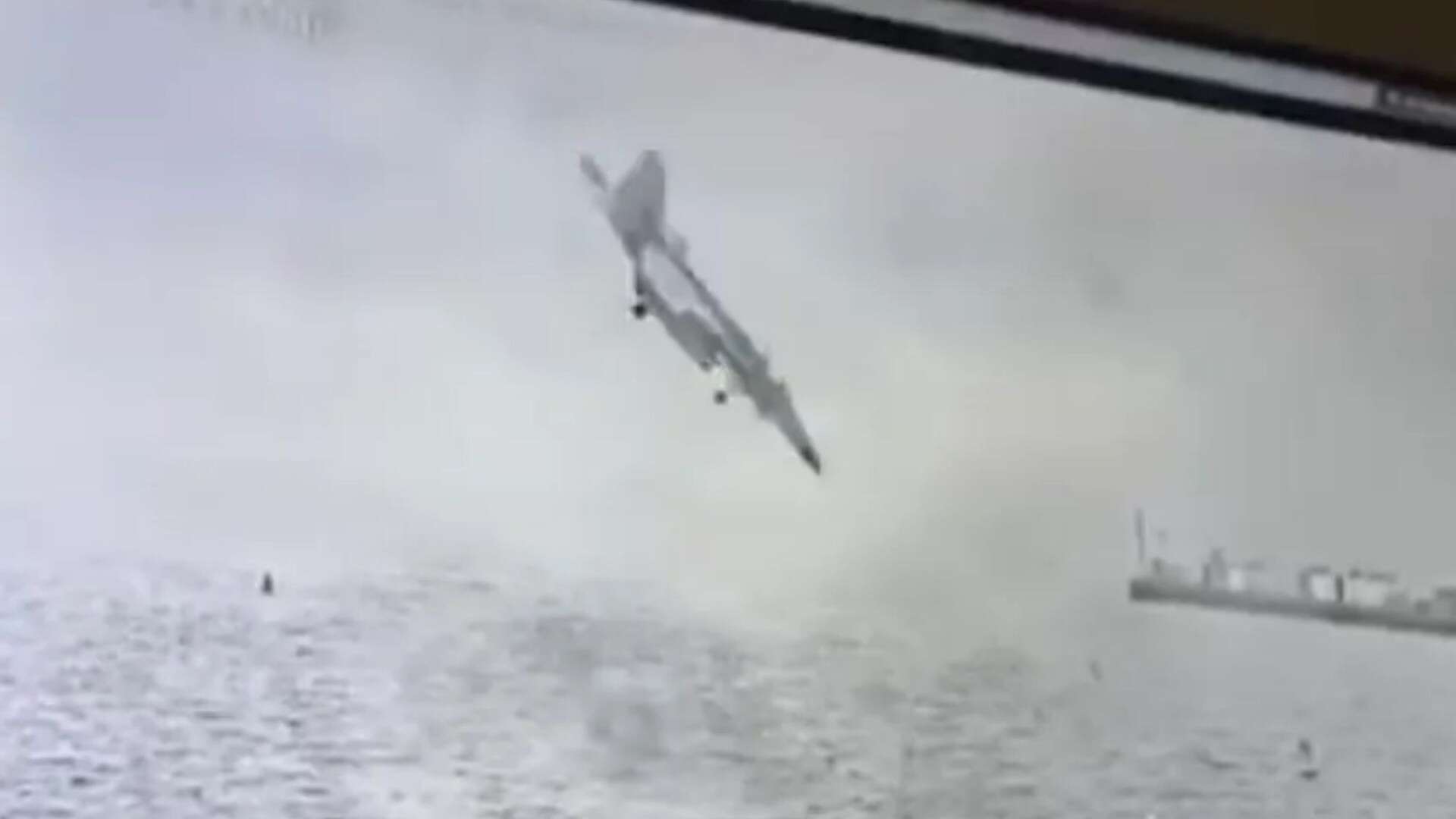 Shock moment US military jet smashes into San Diego Bay after 2 pilots eject