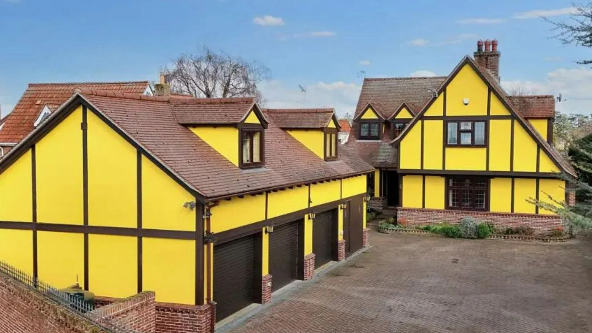 'Hideous' yellow house on sale for £750k hiding 'criminal' secret in garden