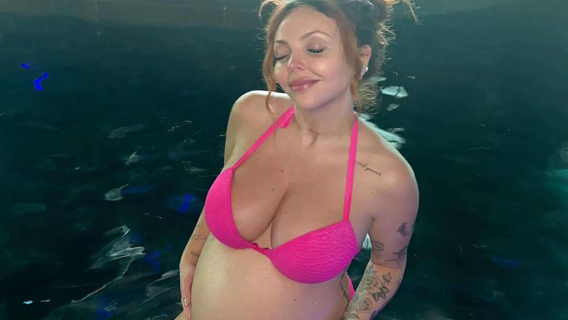 Pregnant Jesy Nelson flaunts blossoming baby bump as she strips to pink bikini