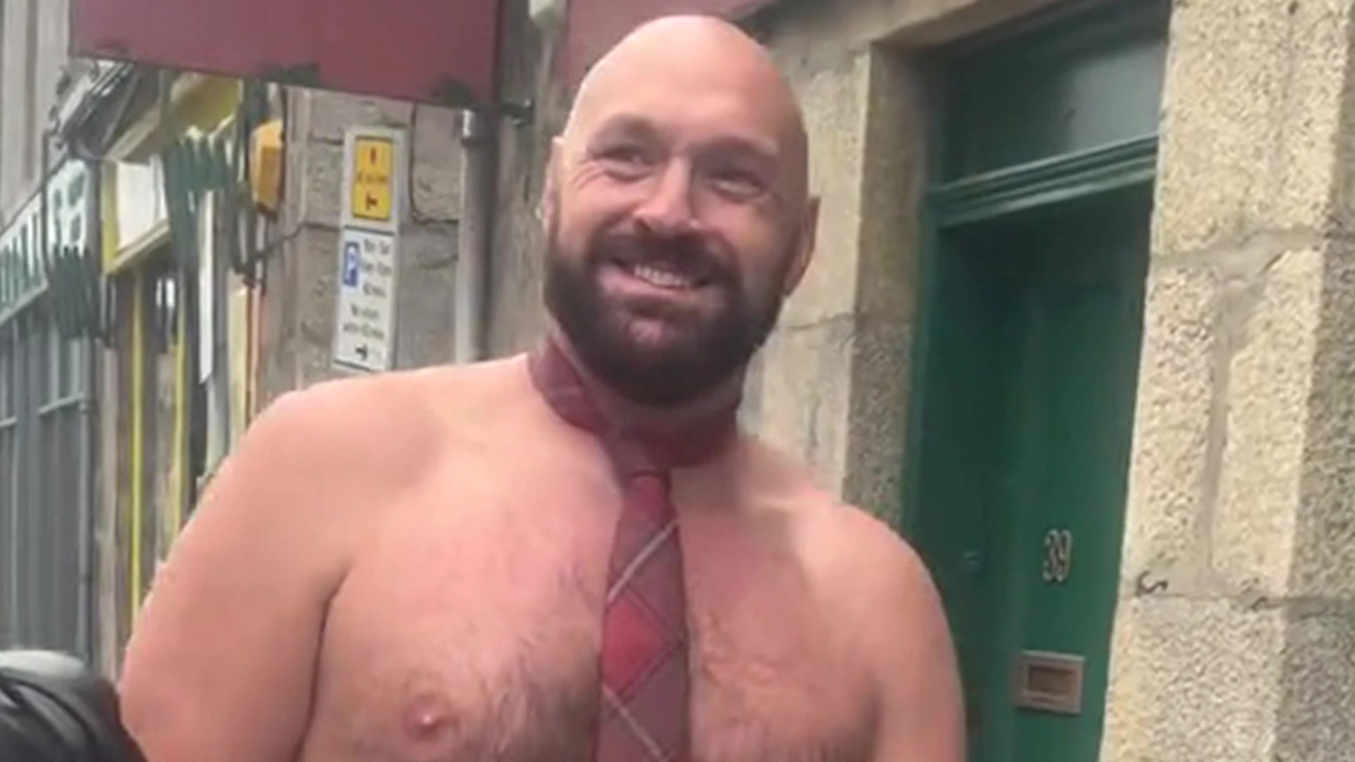 Tyson Fury spotted walking down high street with no top on wearing just a kilt