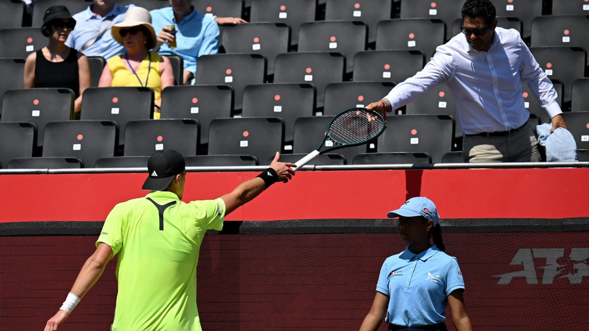 Tennis star's racquet almost flies into Queen's fan in shocking scenes