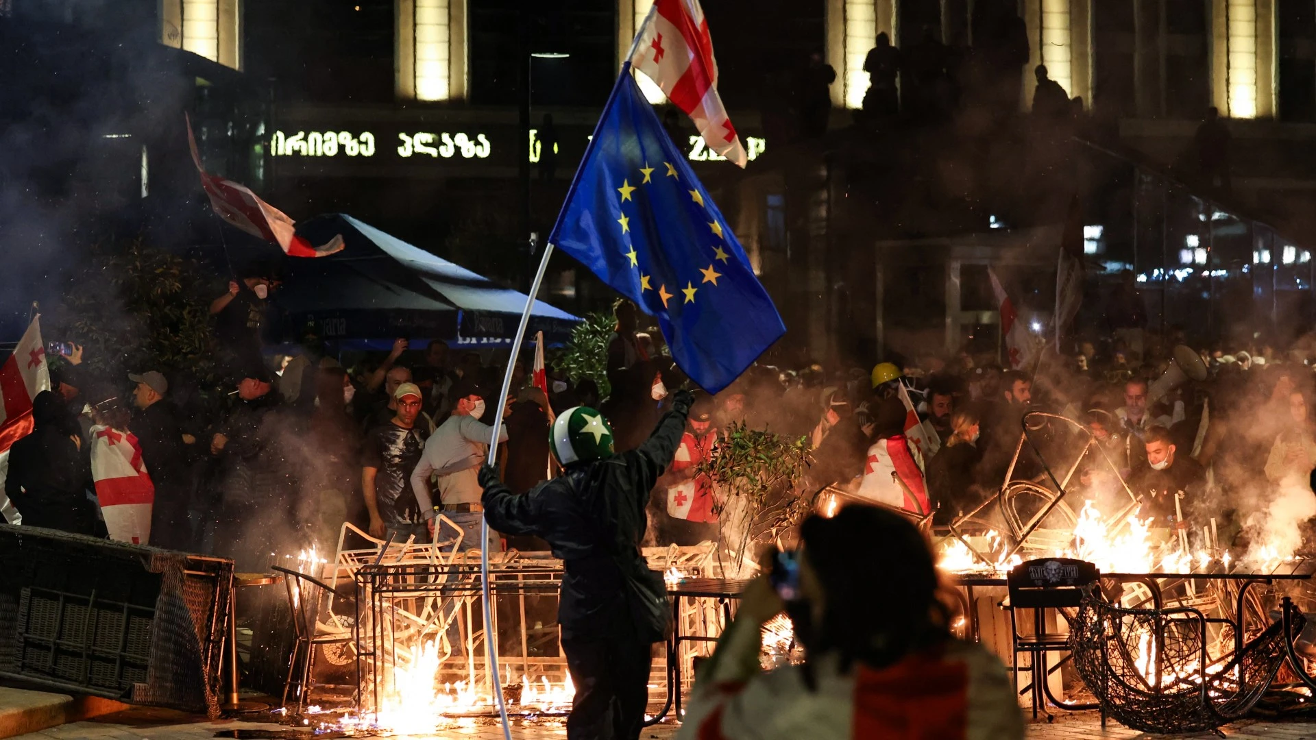 Protesters try to storm Georgia presidential palace as they clash with cops
