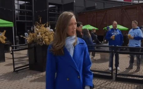 Moment TV reporter shocked by boy, 9, screaming abuse at her in front of his DAD