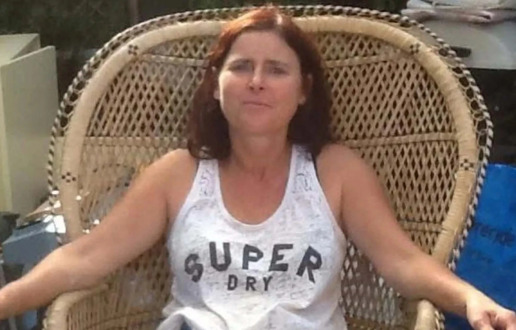 Woman, 58, 'killed inside home' is pictured - as man, 57, charged with murder