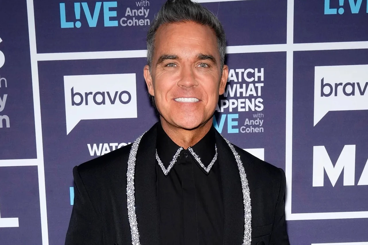 Robbie Williams POSTPONES album release amid fears of clash with star's new LP