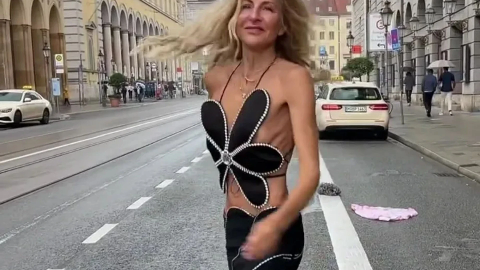 Woman shocks in extremely skimpy outfit - but you’ll never guess her age