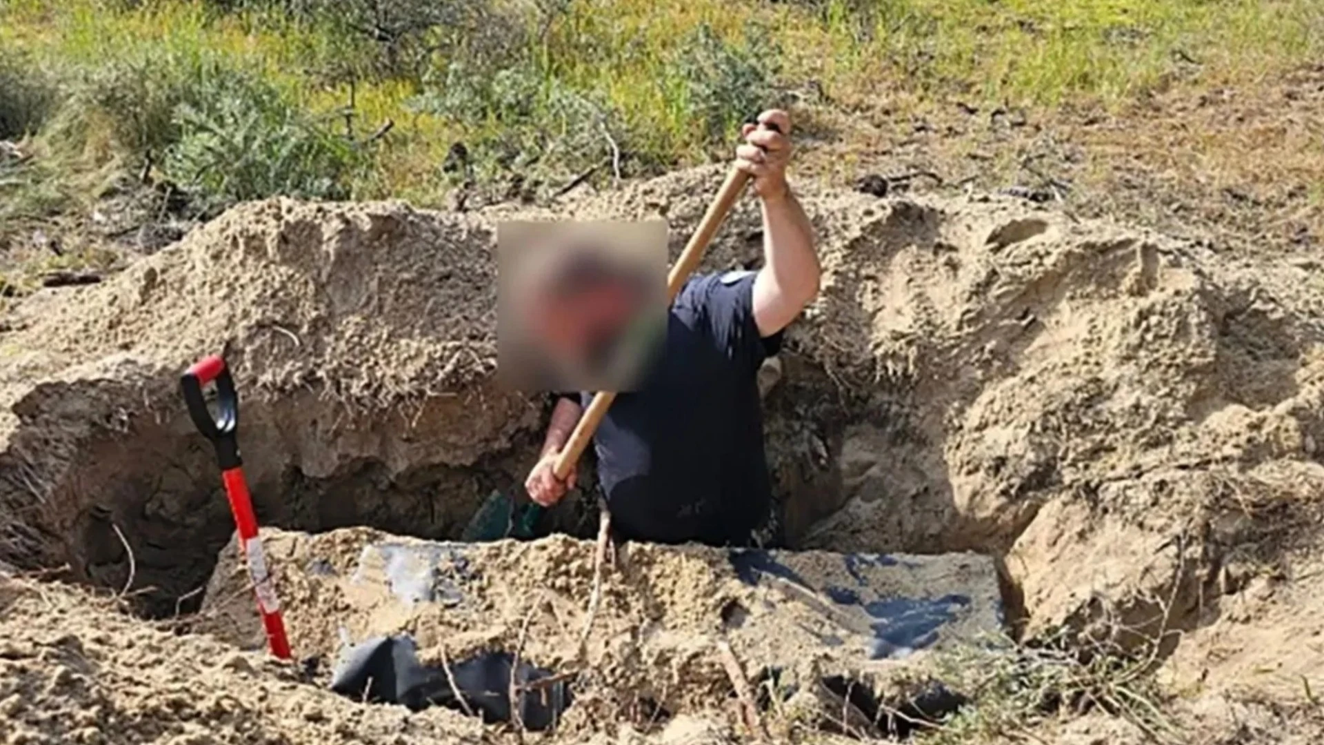 Moment cops dig up migrant dinghies hidden deep under French beach